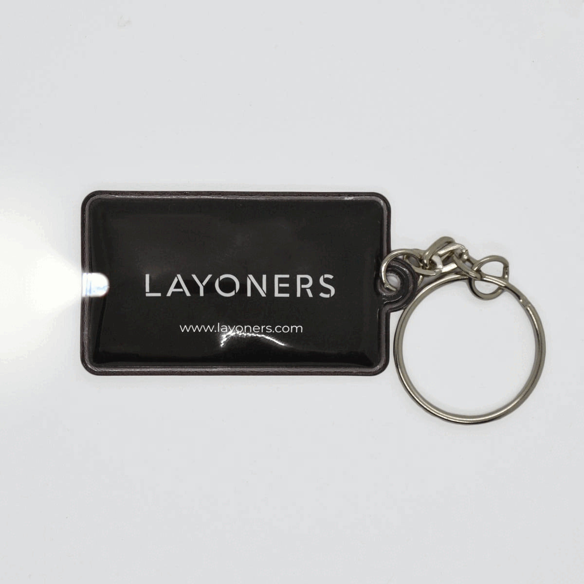 Obesek za ključe z LED lučko